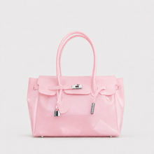 Pink Sencieres jelly Firkin bag, glossy translucent TPU handbag — front view