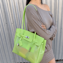 Apple Sencieres jelly Firkin bag, glossy translucent TPU handbag — styled outfit look