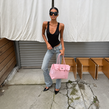 Pink Sencieres jelly Firkin bag, glossy translucent TPU handbag — styled outfit look