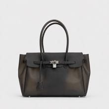 Black Sencieres jelly Firkin bag, glossy translucent TPU handbag — styled outfit look